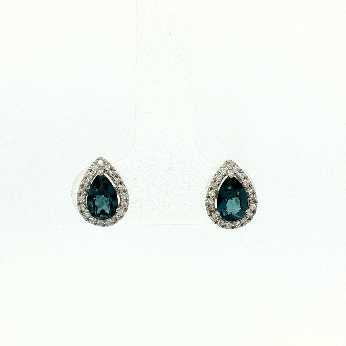Deep Blue Pear Cut Sapphire and Diamond Halo Stud Earrings in White Gold