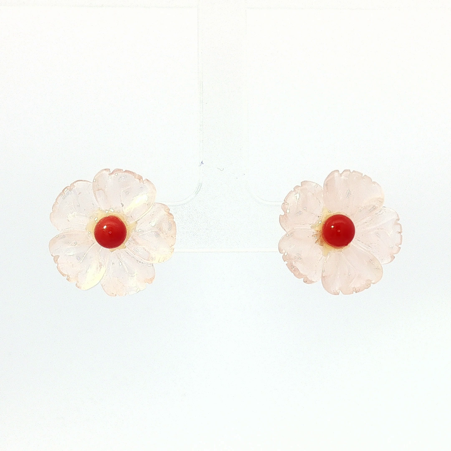 Carved Flower Coral Stud Earrings in Yellow Gold