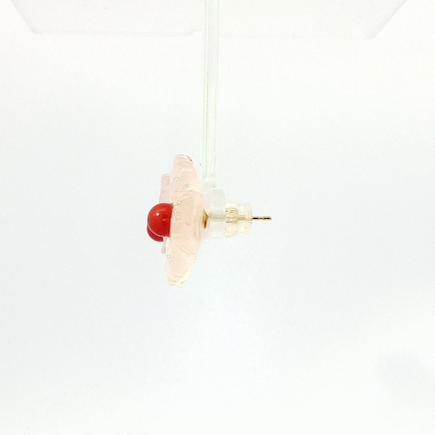 Carved Flower Coral Stud Earrings in Yellow Gold
