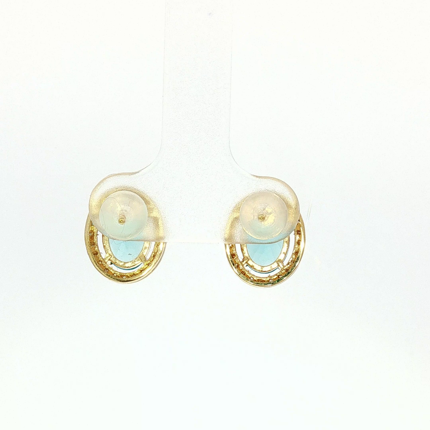 Oval Blue Topaz Halo Stud Earrings in Yellow Gold