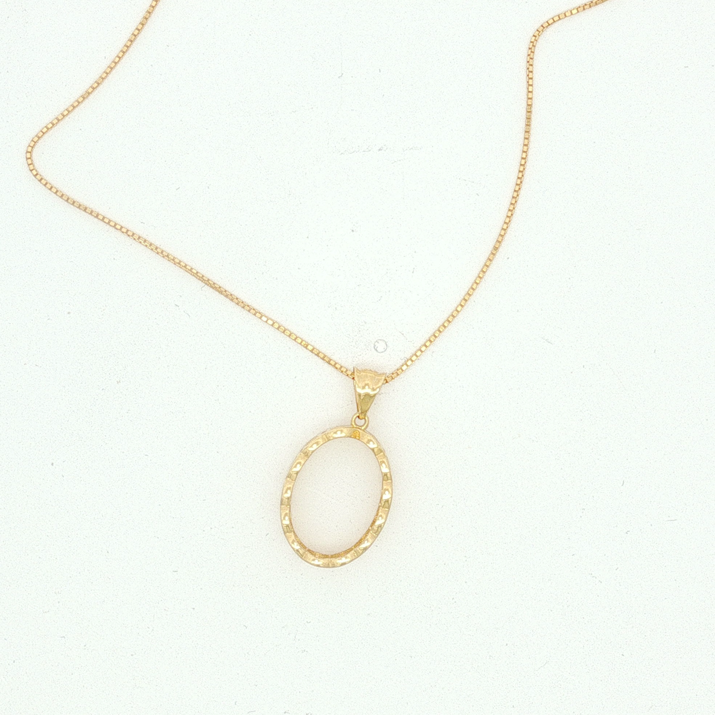 Textured Open Oval Pendant on Yellow Gold Box Chain