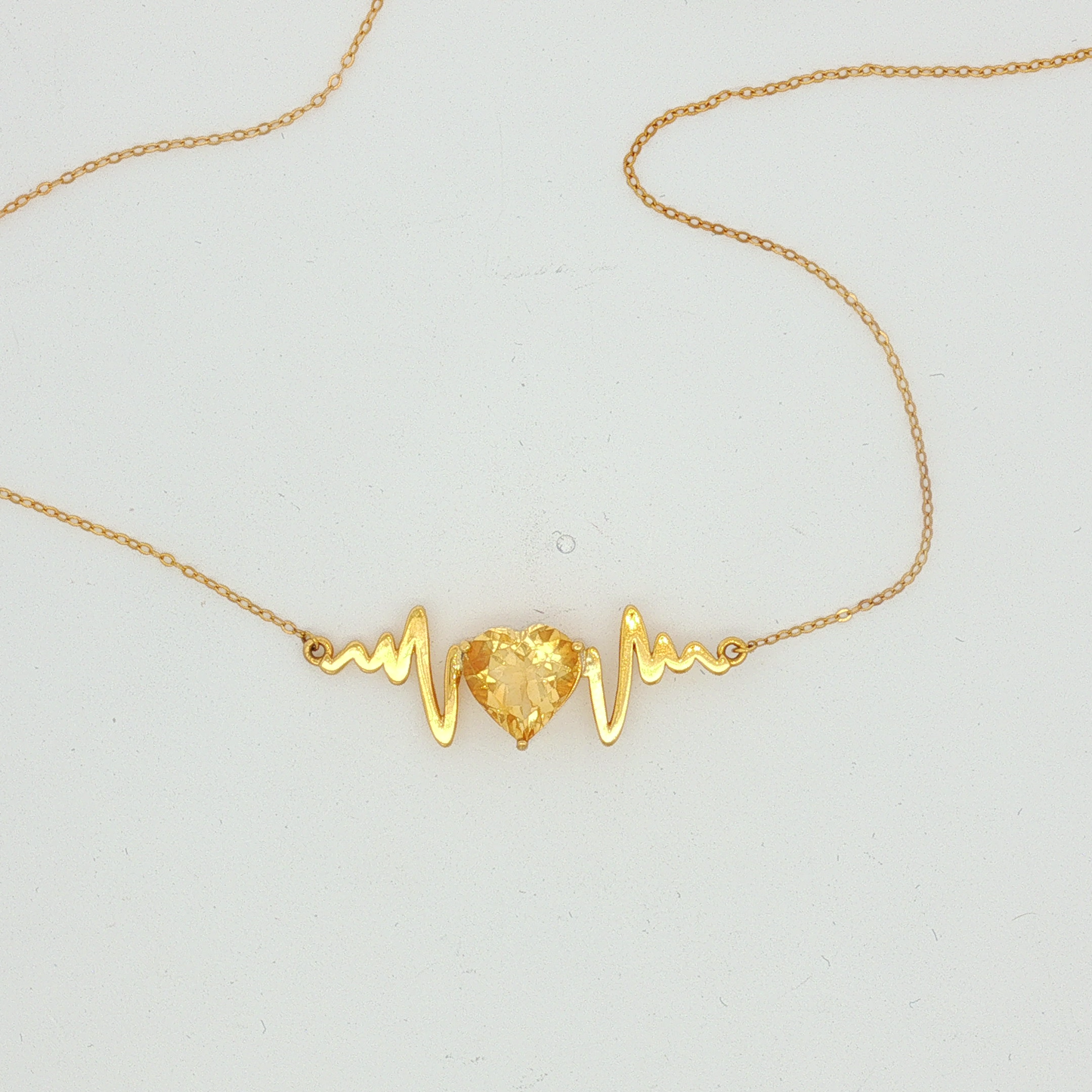 Heart-Shaped Citrine Heartbeat Necklace in Yellow Gold
