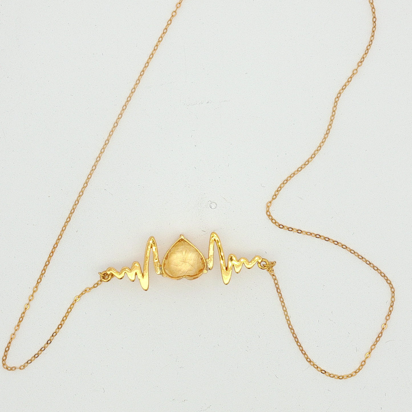 Heart-Shaped Citrine Heartbeat Necklace in Yellow Gold
