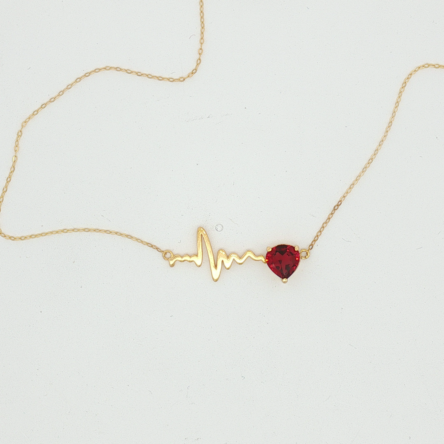 Heartbeat Motif Heart-Shaped Ruby Necklace in Yellow Gold