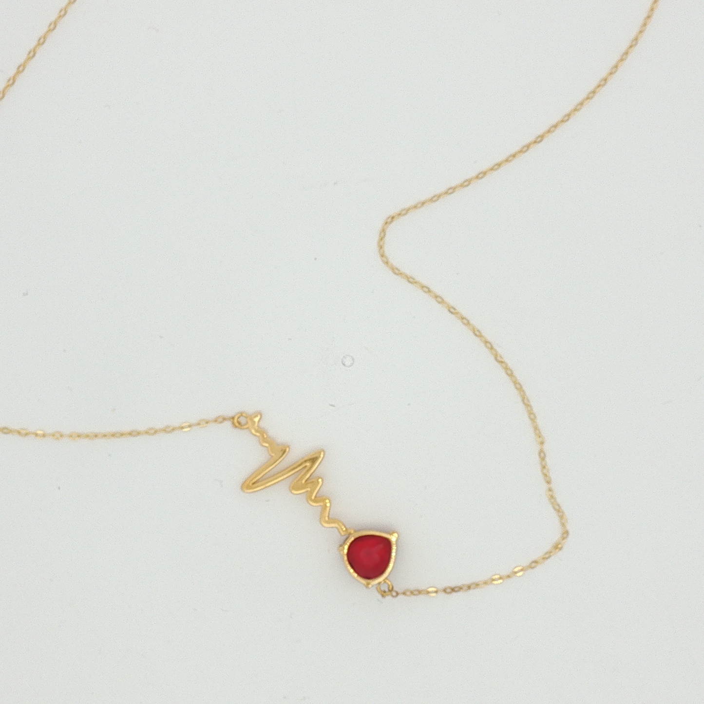 Heartbeat Motif Heart-Shaped Ruby Necklace in Yellow Gold