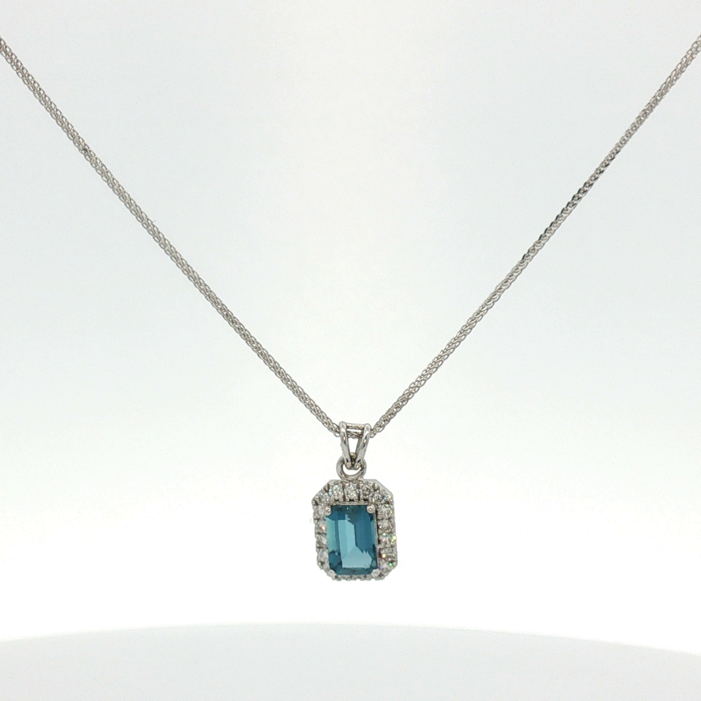 Rectangular Blue Topaz Halo Pendant in White Gold / NLR-REAEE