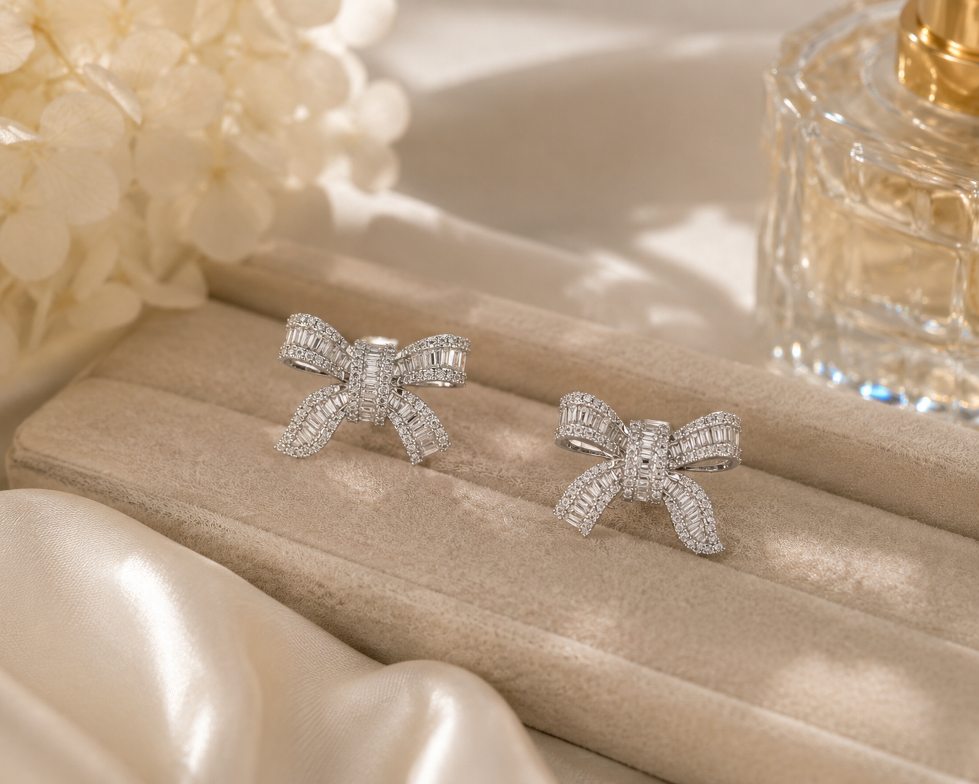 Diamond Bow Stud Earrings in White Gold