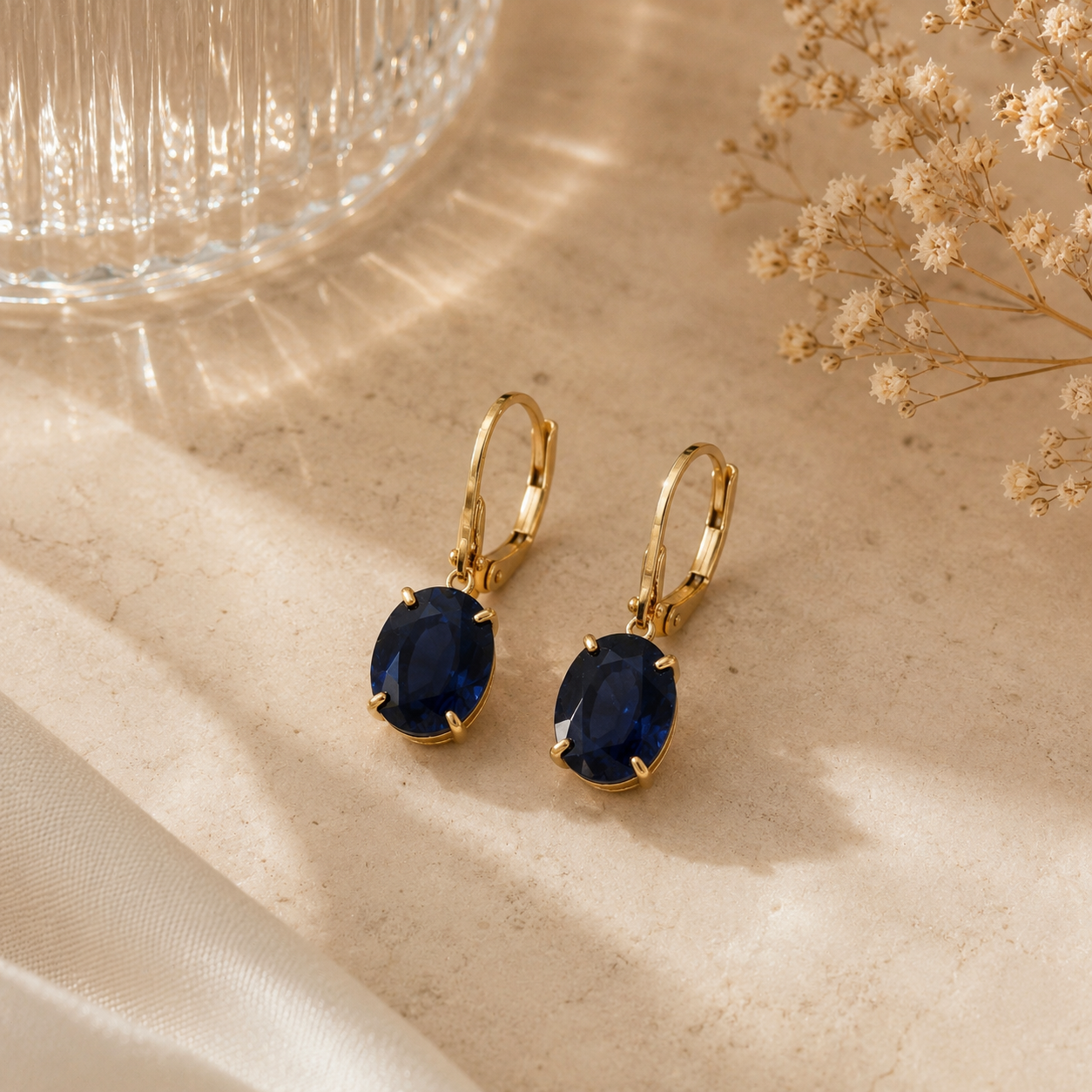Oval Royal Blue Sapphire Drop Earrings in Yellow Gold