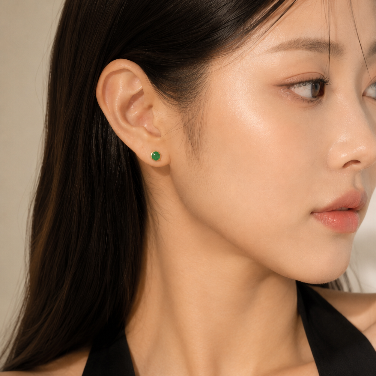 Round Emerald Stud Earrings in Yellow Gold