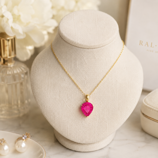 Pear Cut Pinkish-Red Ruby Pendant in Yellow Gold