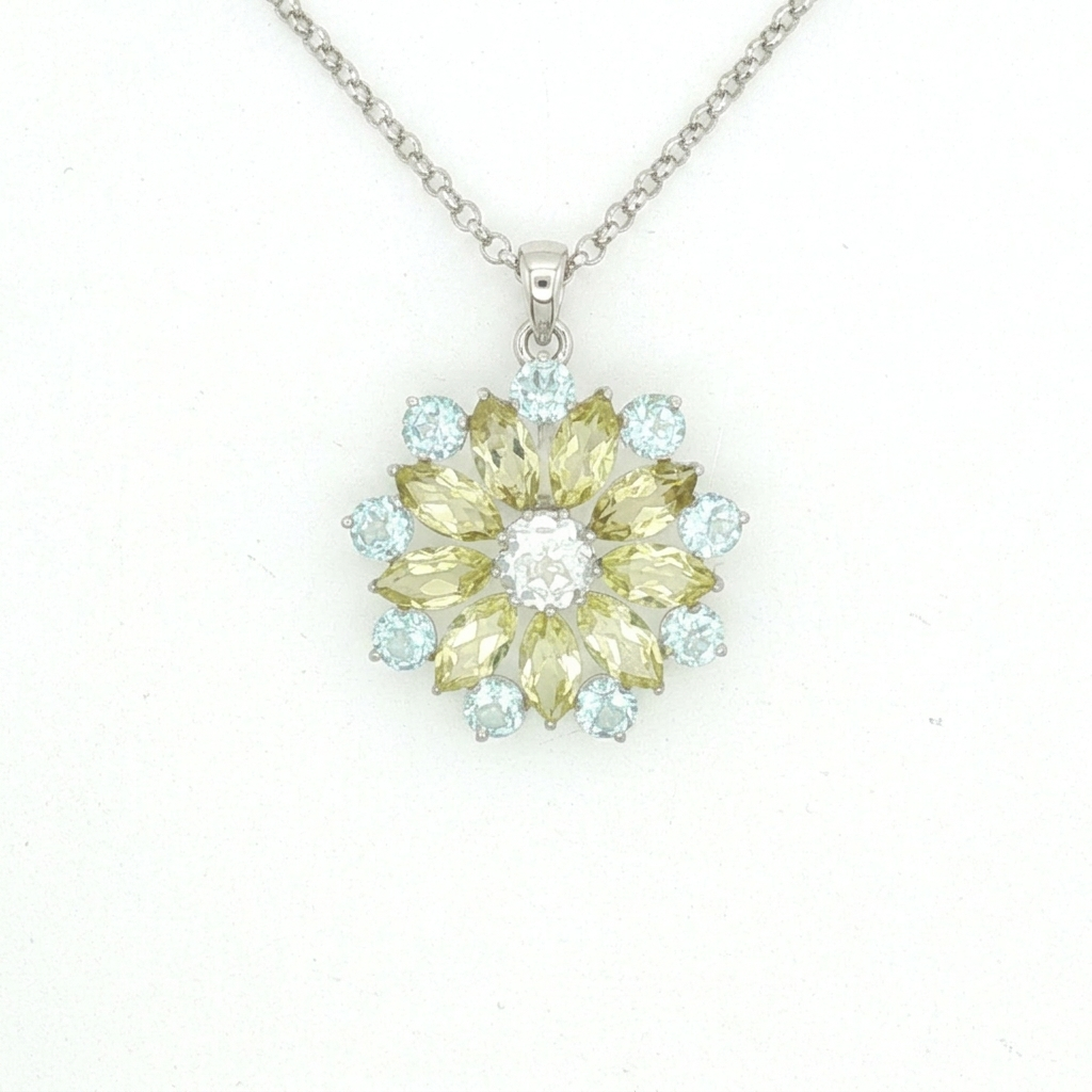 Floral Sunburst Blue Topaz Pendant in White Gold