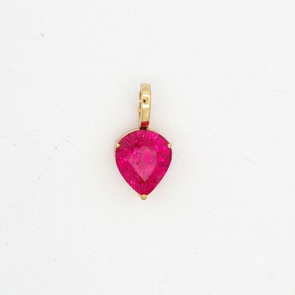Pear Cut Pinkish-Red Ruby Pendant in Yellow Gold